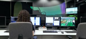 two people working on their computers in the office